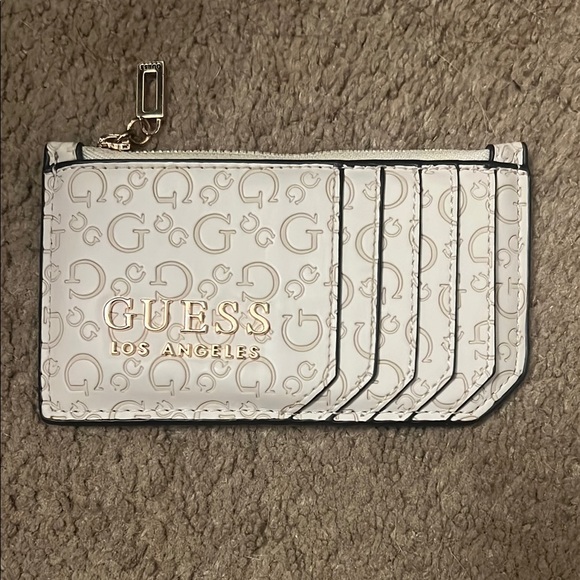 Guess Handbags - GUESS White and Gold Logo Clutch